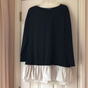 Fun black top with white ruffles